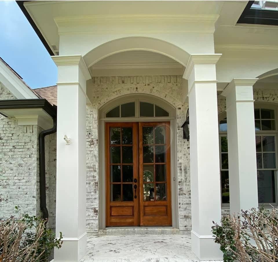 Limewashed Brick and Stained Front Doors — Photo 1